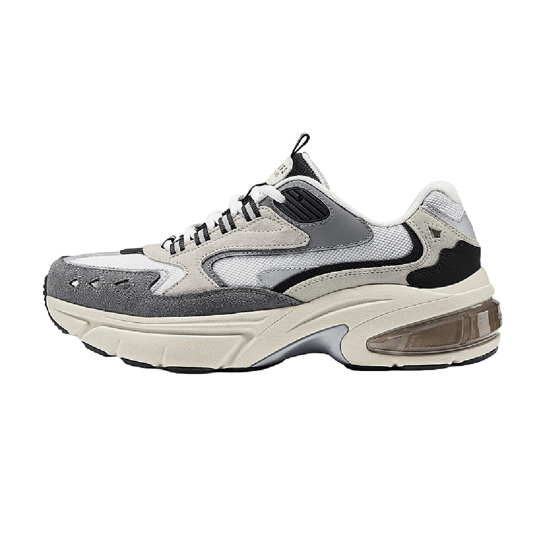 Leather shoes, gray and white lace-up sneaker with black accents and chunky sole.